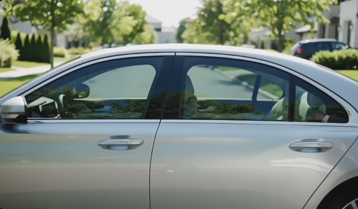 Car side windows switching from clear to a private state at the press of a remote