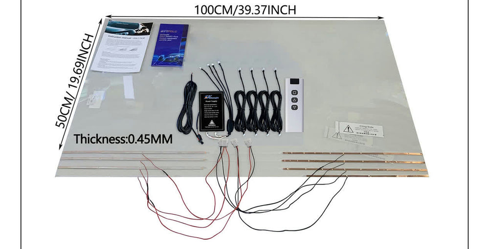 A four-window kit laid out on one sheet of film: the controller, power cord, four wiring harnesses, the remote, the busbar strips and the printed guide