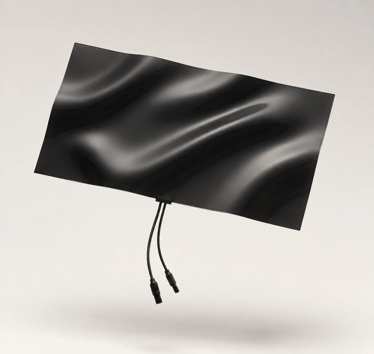 Dark Black TapTint smart tint film sheet with attached power leads